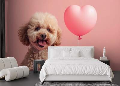 A cheerful dog poses beside a pink heart-shaped balloon against a pastel background. Wall mural