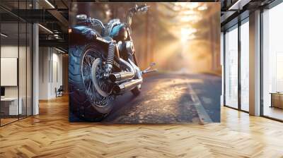 A motorcycle parked on a road in a sunlit forest, showcasing its sleek design and surroundings. Wall mural