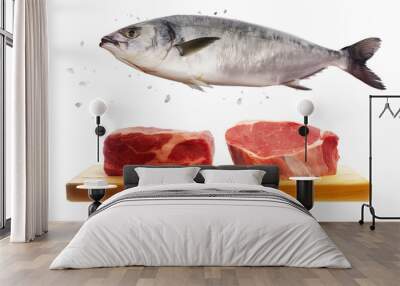 A fish and two cuts of meat, steak, are on a cutting board Wall mural