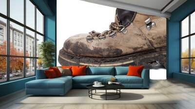 Old trekking boot in mud Wall mural