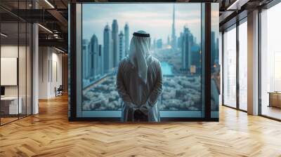 Arab Man in White Thobe Standing in Office Overlooking Dubai Skyline Wall mural