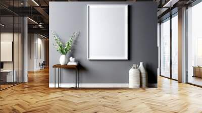 A minimalist living room with a gray wall, a wooden side table with a vase of white flowers, a stack of books, and two white vases with a stack of white plates Wall mural