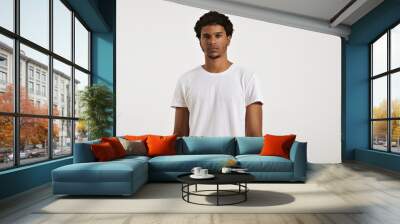 Fit and sexy young black man with an afro wearing a clean unlabeled white t-shirt Wall mural