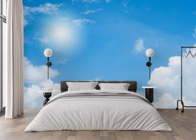 Blue sky and white clouds as background. Wall mural