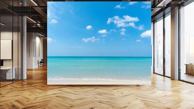 White beach sand Sea water blue Blue sky clear background Wall mural