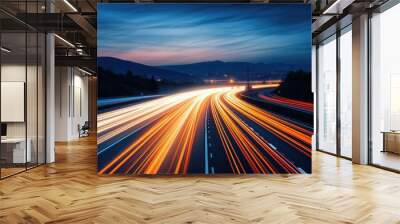 A blurred highway at night, with streaks of light from passing cars creating dynamic lines Wall mural