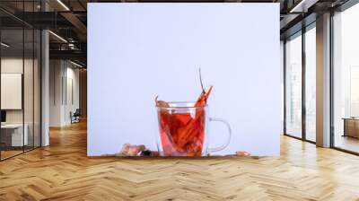 Healthy red herb drinks isolated background Wall mural