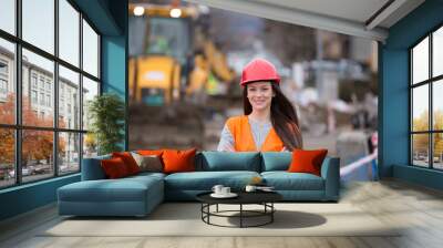 Woman engineer on construction site Wall mural