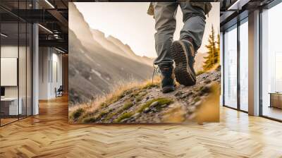 Close-up of the trekking shoes of a hiker crossing a mountainous area at the top of a hill. Generative AI. Wall mural