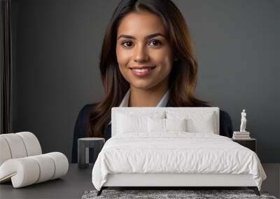 Businesswoman confidently posing in professional attire for corporate headshot Wall mural