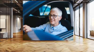 Mature women at car  Wall mural