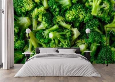 Macro photo green fresh vegetable broccoli. Fresh green broccoli on a black stone table.Broccoli vegetable is full of vitamin.Vegetables for diet and healthy eating.Organic food. Wall mural