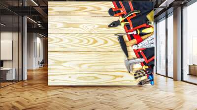 tools in tool belt on wood planks with copy space Wall mural