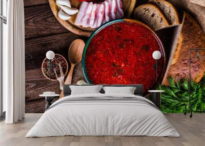 Ukrainian beetroot soup - borscht, on napkin, on wooden backgrou Wall mural