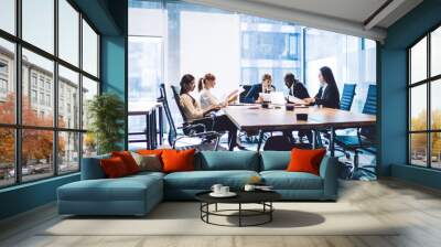 Communicating business people in conference room Wall mural