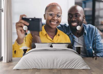 Relaxed colleagues taking selfie in cafe Wall mural