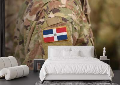 Flag of Dominican Republic on soldier arm. Flag of Dominican Republic on military uniforms (collage). Wall mural