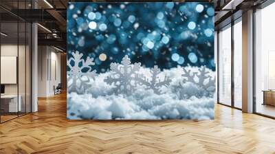 Decorative snowflakes against a blue natural background with falling snow and bokeh. Christmas winter background. Wall mural