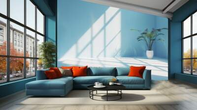 Featuring a blue wall with beautiful highlights of light and shadow, this background is an abstract universal backdrop for a presentation. Wall mural