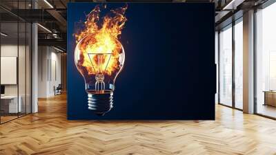 Fire and flames from a light bulb isolated on a blue background. Wall mural