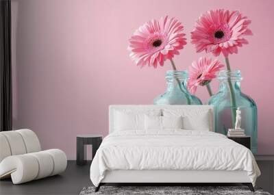 Home interior decor with pink gerbera flowers in a vase Wall mural