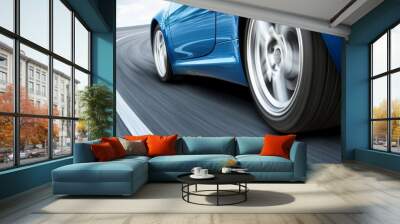 In motion, a fast blue car on the high speedway is seen from the rear. Wall mural