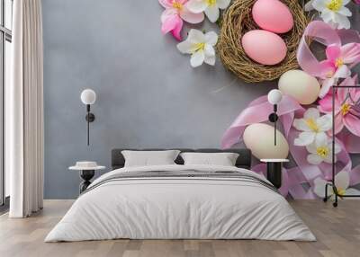 This flat lay is a happy Easter concept with easter eggs in nests and spring flowers. A flat lay with easter eggs and spring flowers with copy space. Wall mural