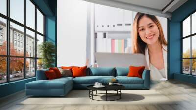 Asian beautiful empower woman smiling with friend working at meeting room in office interior background with copy space.Owner businesswoman startup with confident and cheerful. Wall mural