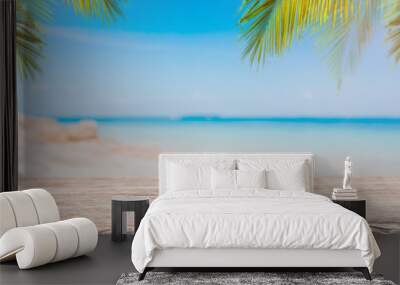 Empty wood table top and blurred Palm tree summer beach with blue sea and sky background. - can used for display or montage your products. Wall mural