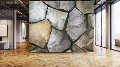 stone wall surface can use as background pattern or texture with real light at old town Songkhla Thailand
 Wall mural