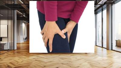 Thigh pain or muscle cramp in asian woman with on white background using for health care concept. closeup photo, blurred. Wall mural