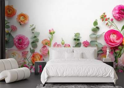 Floral border of pink and orange ranunculus, hyacinth and eucalyptus on a white background. Top view Wall mural