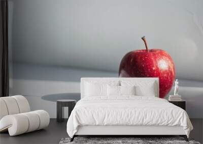 Fresh Red Apple on White Surface with Soft Shadow Wall mural