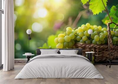 Green grape in Bamboo basket on wooden table in garden, Shine Muscat Grape with leaves in blur background. Wall mural