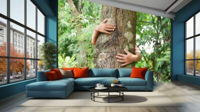 hands hugging a tree,Love World Concept and Nature Conservation Wall mural