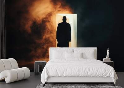 Man getting out from the darkness opening door Wall mural