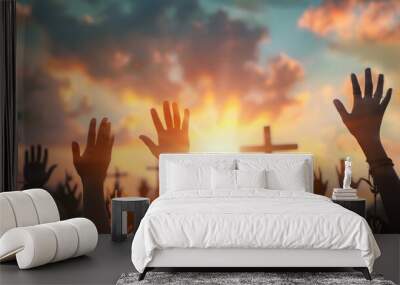 Nativity Christmas concept: Many people open empty hands with palm up over blurred cross and crown of thorns at sunset background Wall mural