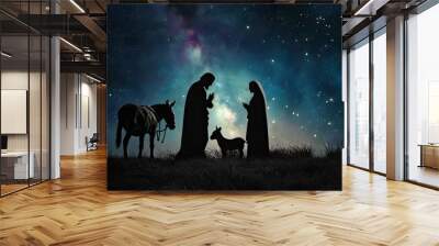 Nativity Christmas concept: Silhouette Mary and Joseph journeying through the dessert with a donkey on sunset looking for a place to stay Wall mural