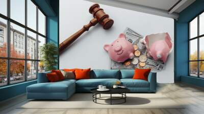 Broken piggy bank with cash and wooden gavel on a white background. Top view. Wall mural