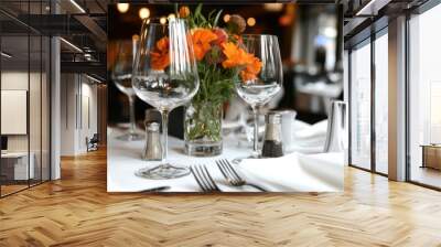 Elegant spring dining table setup with wine glasses for restaurant decor Wall mural