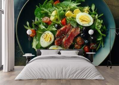 Fresh nioise salad with seared tuna on dark wooden table setting Wall mural