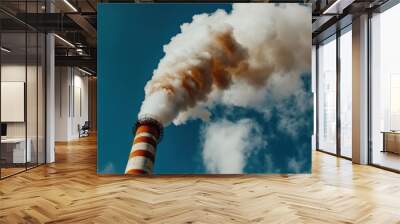 Industrial environmental impact: smoking chimneys against blue sky for energy sector insights Wall mural