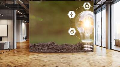 Green energy innovation light bulb with future industry of power generation icon graphic interface. Concept of sustainability development by alternative Wall mural