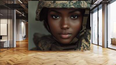 Young black woman wearing military uniform including camouflage fatigues and a helmet. She is ready for war to protect and serve her country. generative ai Wall mural