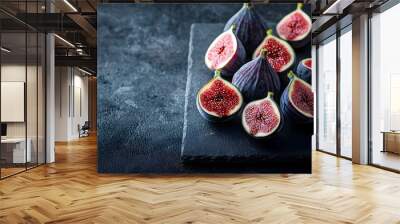 Cluster of Sliced Figs on Slate Board Showcasing the Vibrant Interior and Texture Wall mural