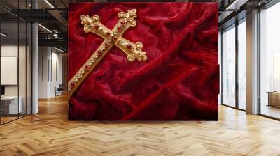 Elegant Gold Cross Adorned with Precious Gems on Luxurious Red Velvet Background Wall mural