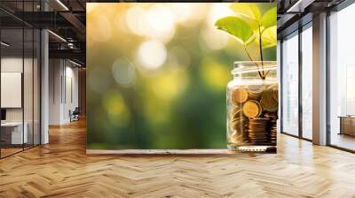 Financial Growth. Money Jar with Plant on Wooden Table. Business Investment Concept. Savings and Success Wall mural