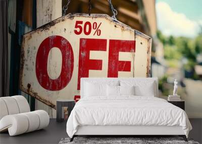 Vintage 50 Off Discount Sign Hanging on Quaint Town Storefront Wall mural