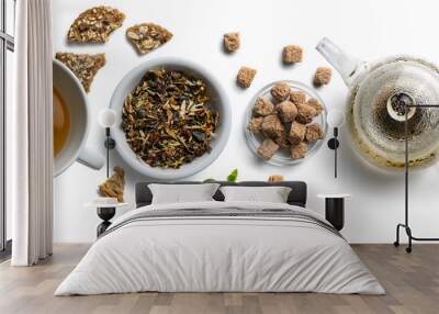 Green tea with natural aromatic additives and accessories. Top view on white background Wall mural