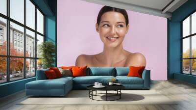 Excited Smiling Brunette Beauty Spa Woman with Naked Shoulders, Undress on Pink Background Wall mural